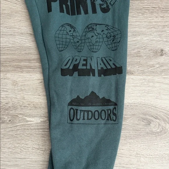 Nike Open Air Performance Men's Club Fleece Cuff Pants - Green - Picture 6 of 12